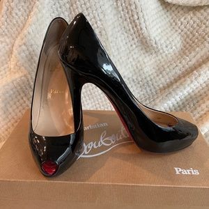 Christian Louboutin Black Patent Leather.